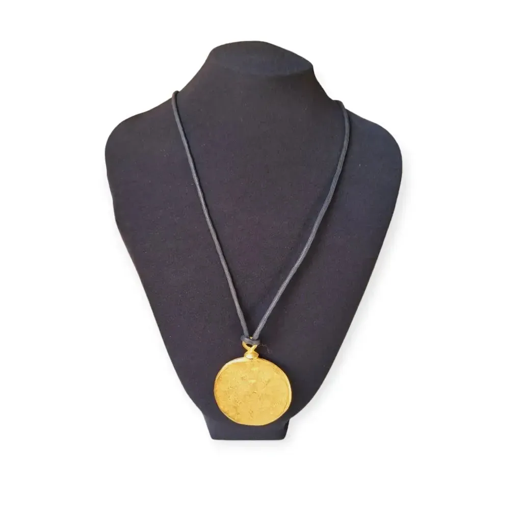Isabel Marant matte gold circle necklace, French brutalist jewelry.