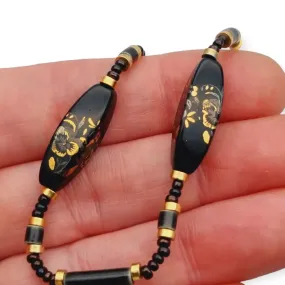 Vintage beaded necklace, black glass with gold flowers, 1940s, type